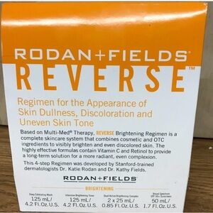 Rodan + Fields Reverse Brightening Serum - White and Orange